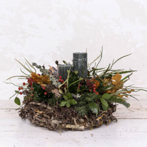 Centro floral con vela aromática